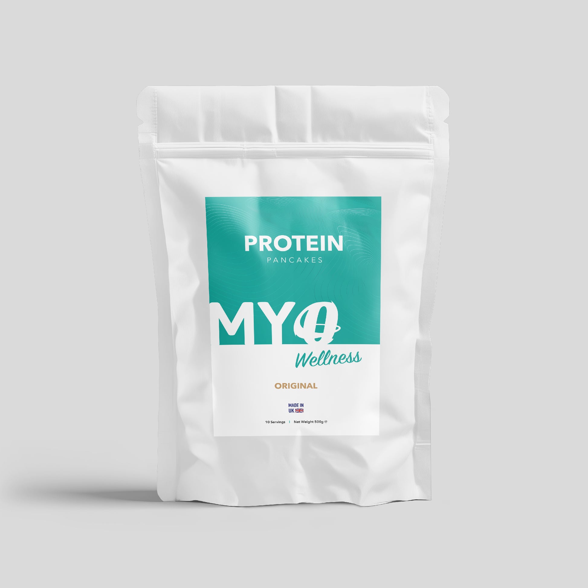 MYOwellness Protein pancake powder mix package on a gray background